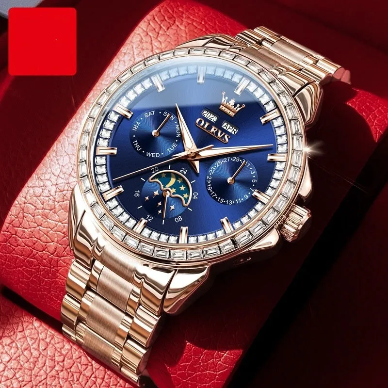 Men's stainless steel automatic mechanical watch with a blue dial and butterfly clasp on a wrist.