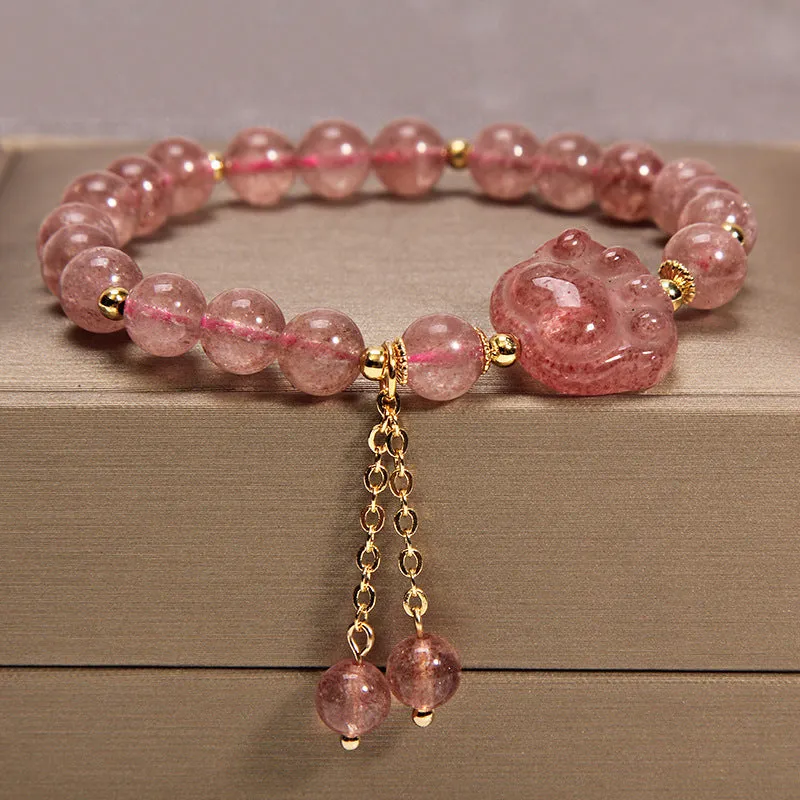 Women's multi-layer crystal bracelet with natural garnet, strawberry quartz pendants, and jinsi jade beads in assorted colours.