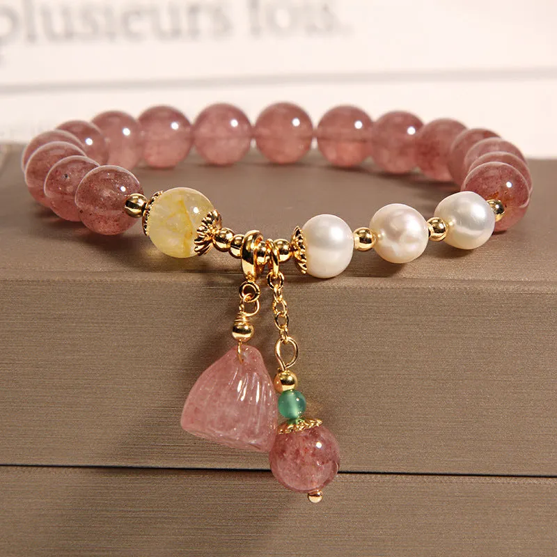 Women's multi-layer crystal bracelet with natural garnet, strawberry quartz pendants, and jinsi jade beads in assorted colours.