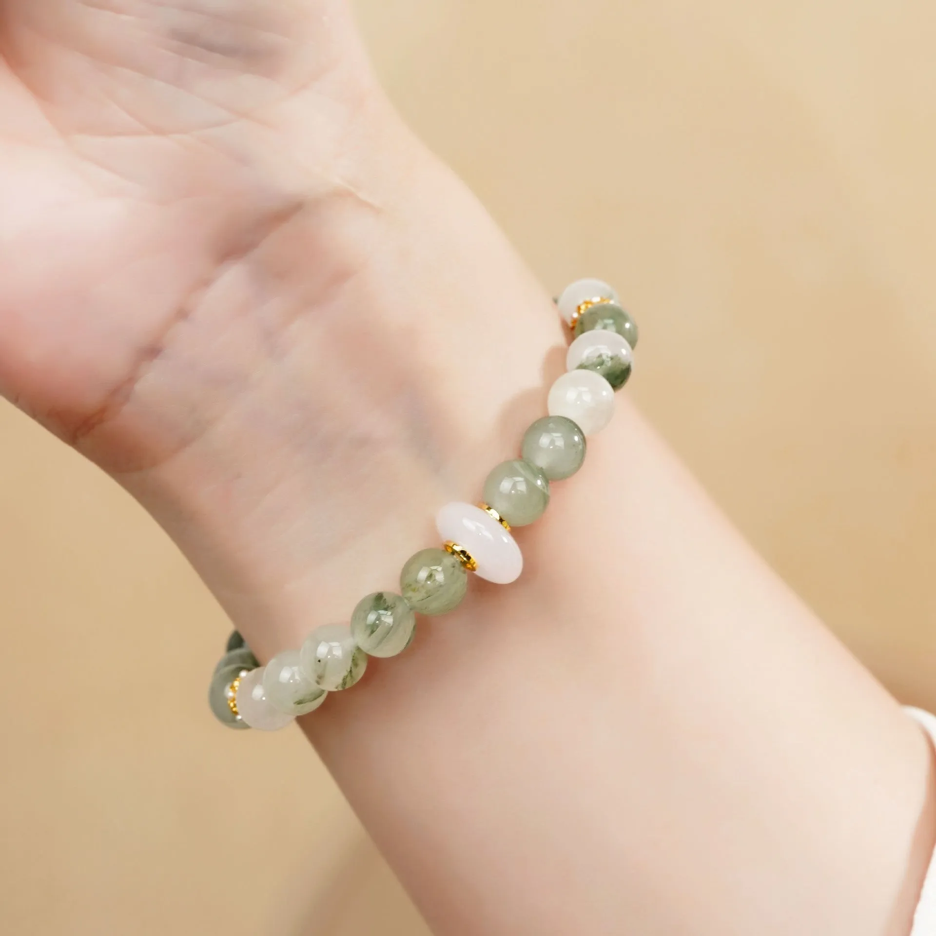 Emerald green Tian Shan Cui jade bracelet with floating flower girl half design and round elements