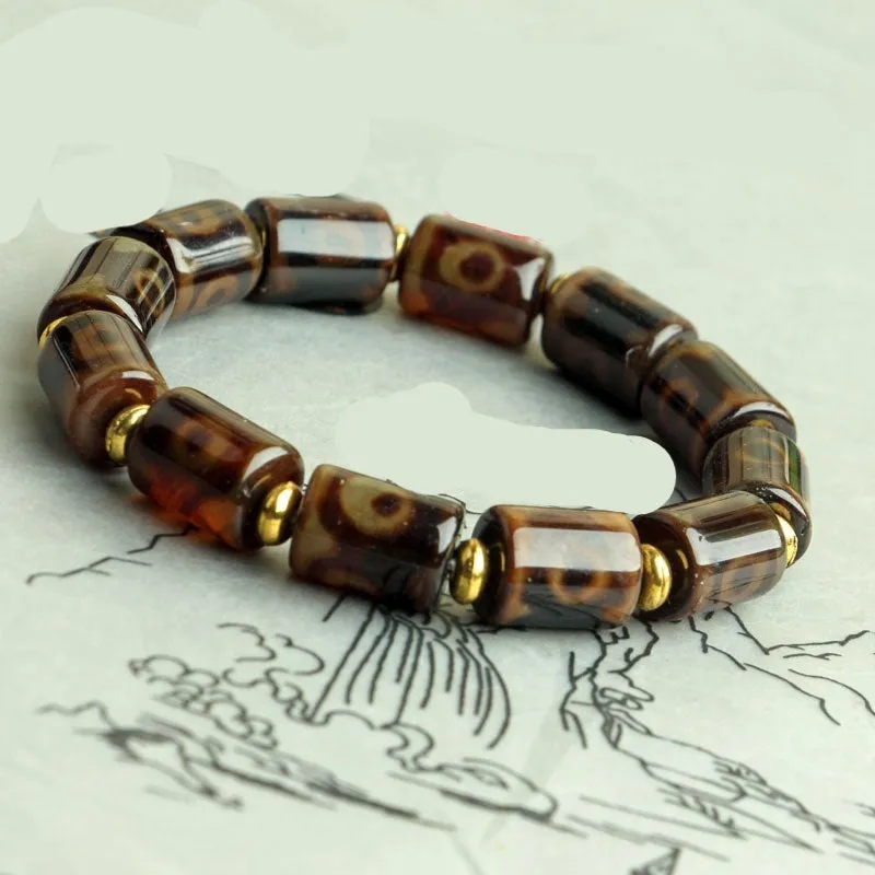 Distressed agate Tibet beads bracelet with three eye dzi design and polished stone beads