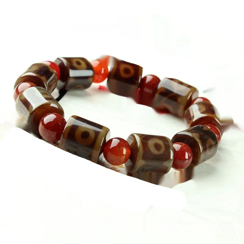 Distressed agate Tibet beads bracelet with three eye dzi design and polished stone beads