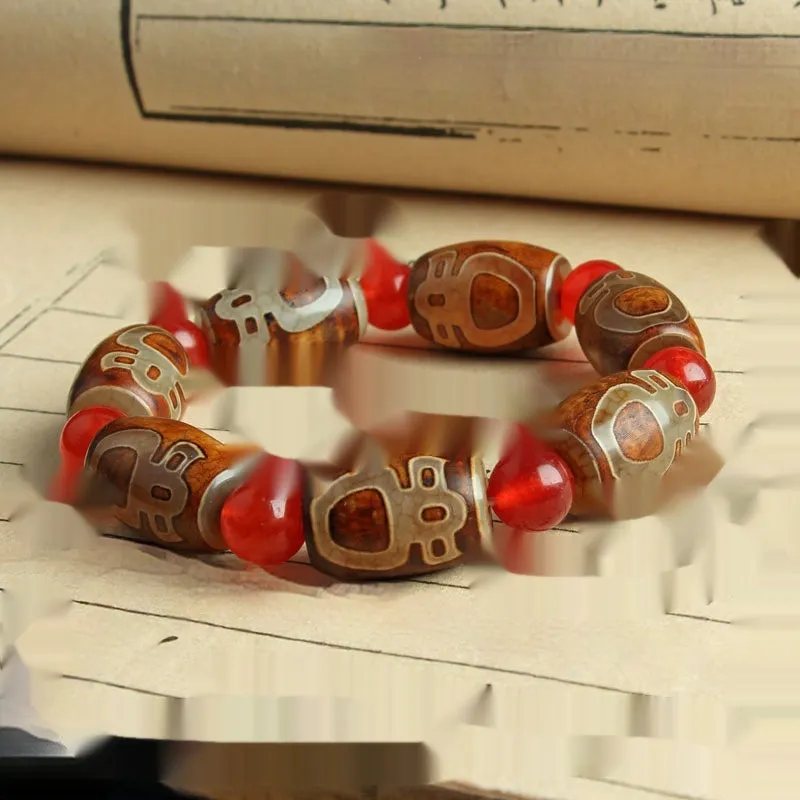 Distressed agate Tibet beads bracelet with three eye dzi design and polished stone beads