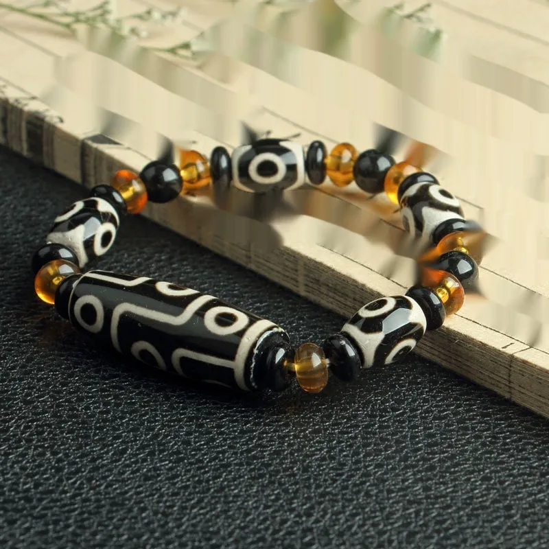 Distressed agate Tibet beads bracelet with three eye dzi design and polished stone beads