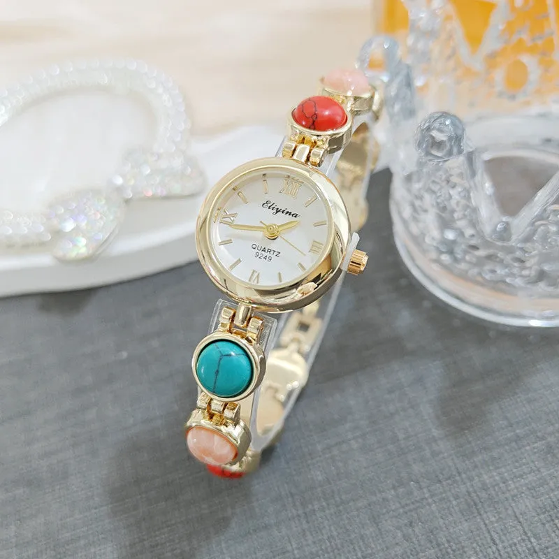 Women's Chinese style watch with thin 8mm case and gold or white dial options