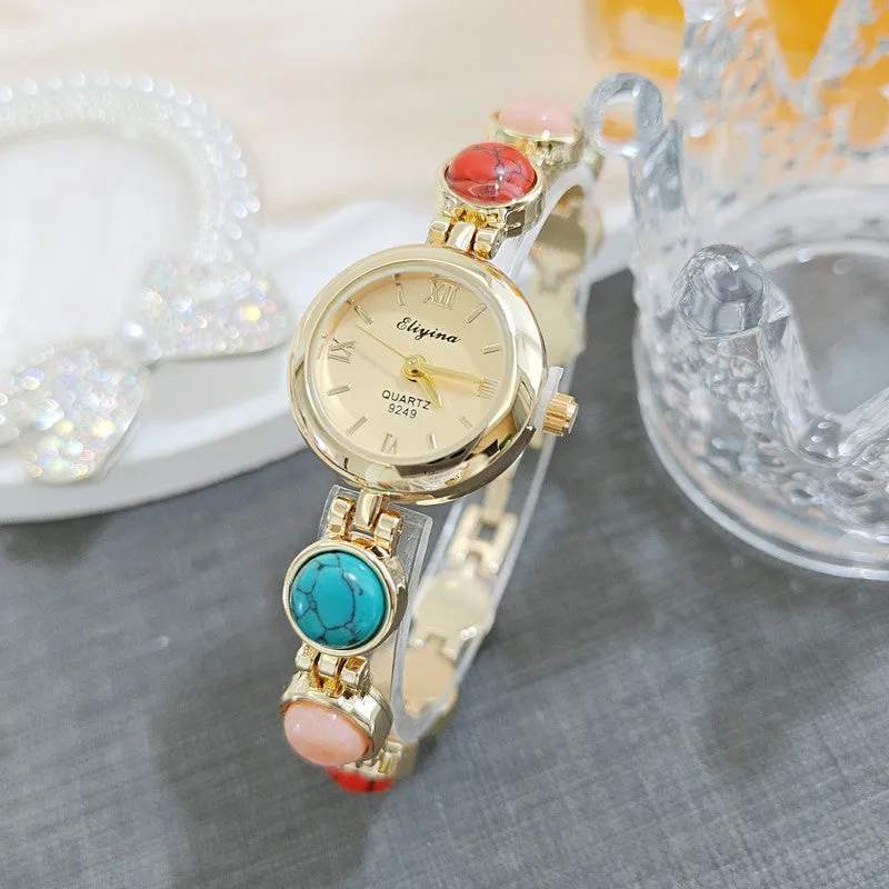 Women's Chinese style watch with thin 8mm case and gold or white dial options