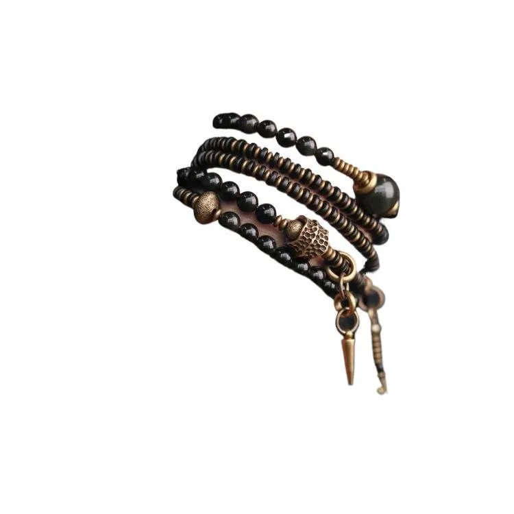 Black geometric patterned beaded bracelet with multi-layered natural materials design