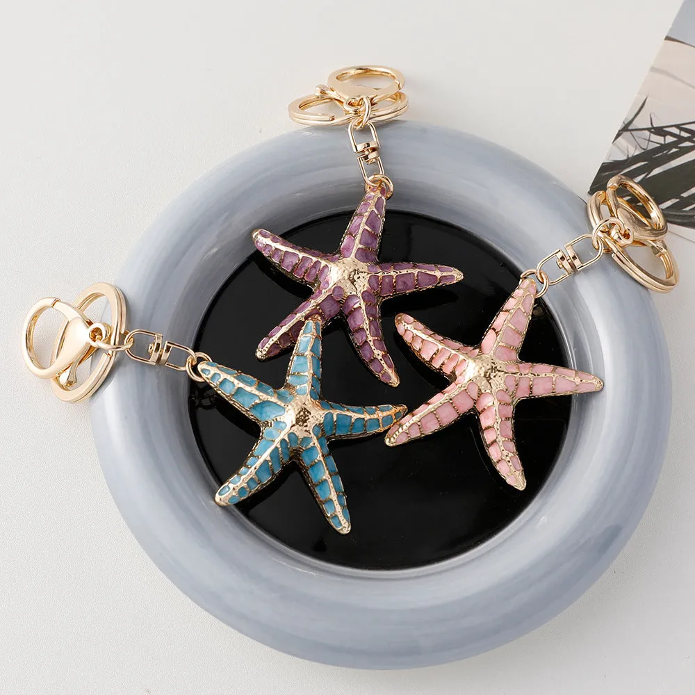 Ocean Series starfish shell keychain with electroplated finish in blue pink and purple colours