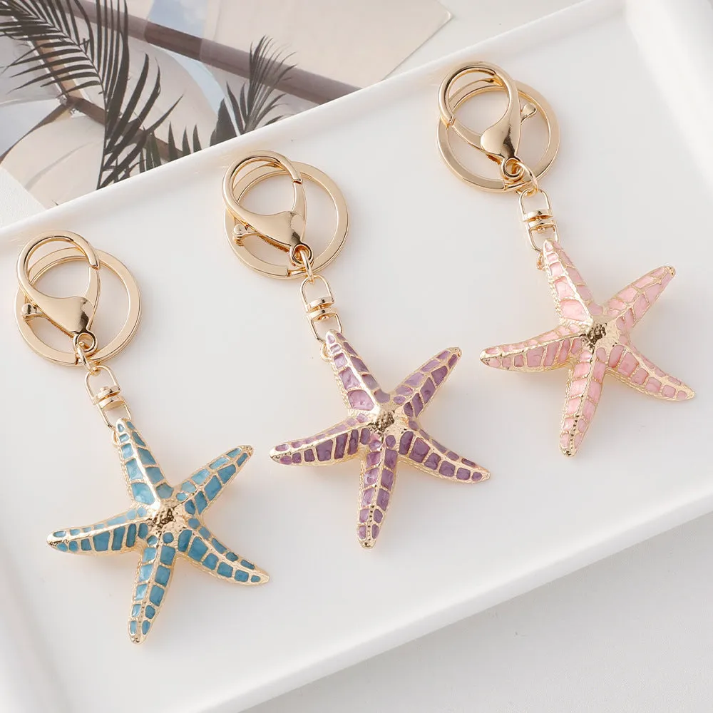 Ocean Series starfish shell keychain with electroplated finish in blue pink and purple colours