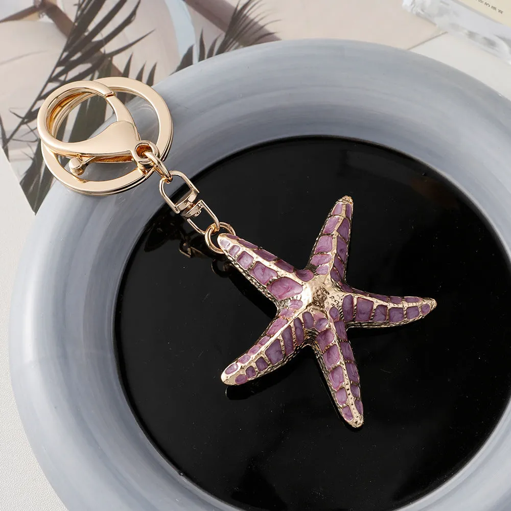 Ocean Series starfish shell keychain with electroplated finish in blue pink and purple colours
