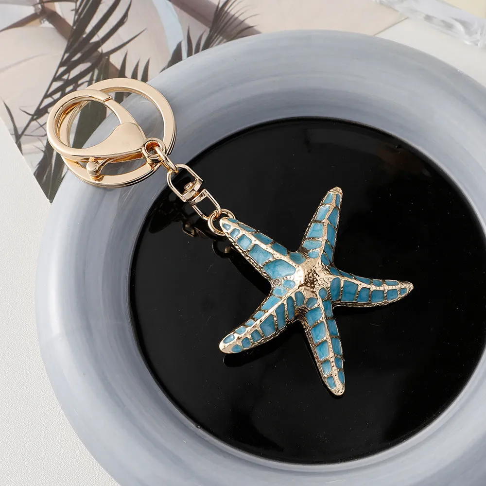 Ocean Series starfish shell keychain with electroplated finish in blue pink and purple colours