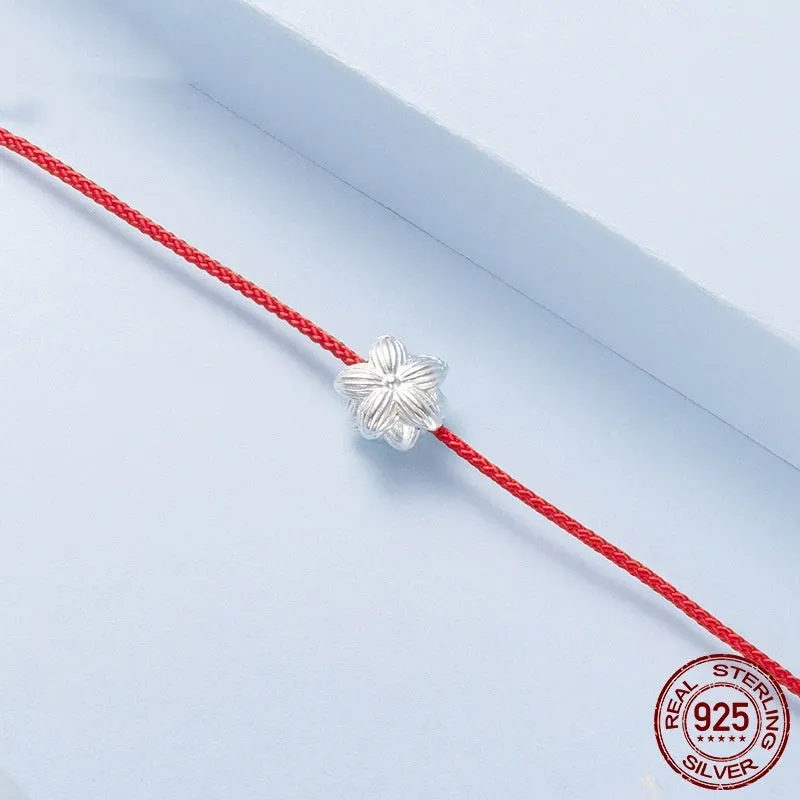Original S925 silver lotus red rope bracelet for women, simple floral design on white background
