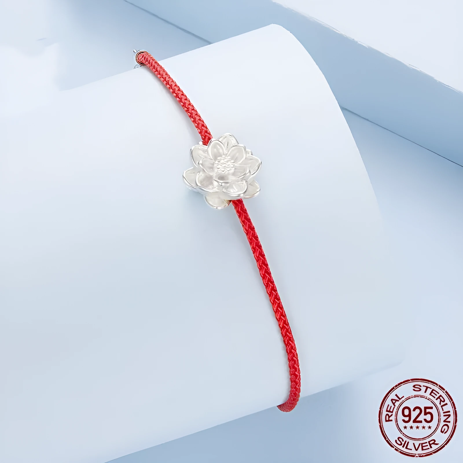 Original S925 silver lotus red rope bracelet for women, simple floral design on white background