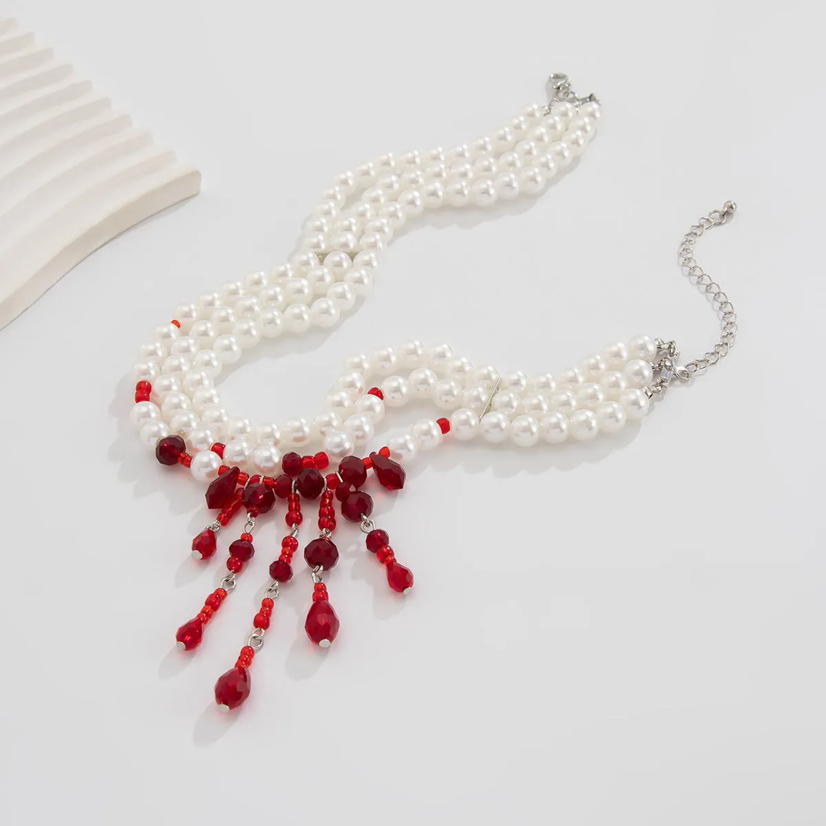 Halloween blood drop geometric pendant necklace with crystal and pearl elements on adjustable chain