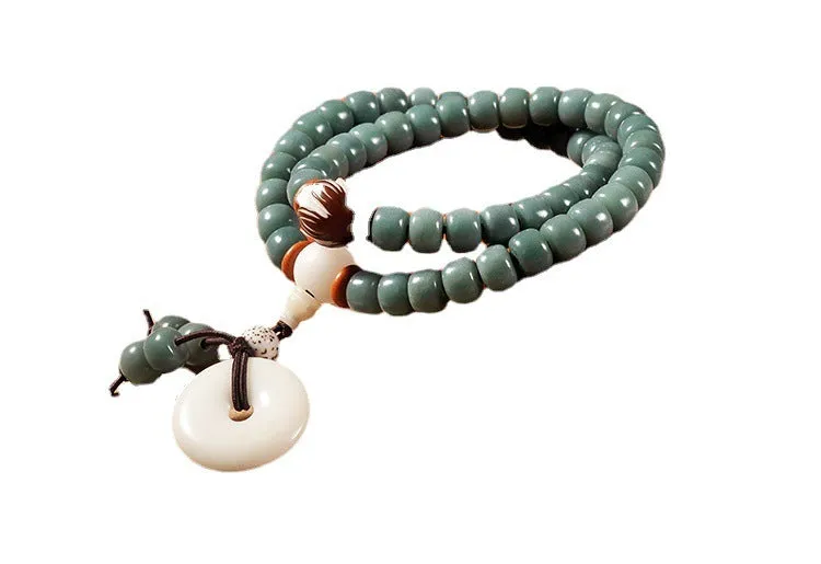 White jade and green sandalwood bodhi seed bracelet with double circle safety buckle and lotus design