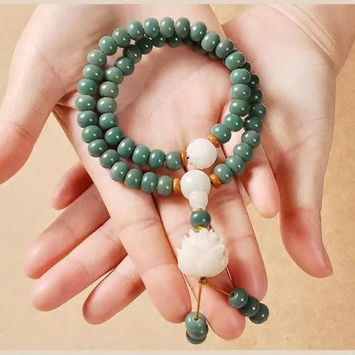 White jade and green sandalwood bodhi seed bracelet with double circle safety buckle and lotus design