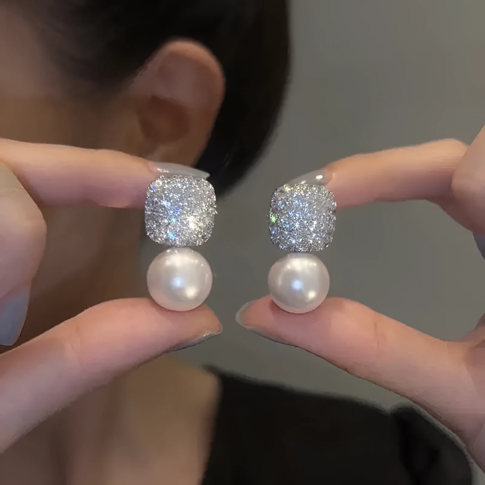 Micro inlaid zircon square pearl stud earrings with tassel detail in copper and imitation pearl, available in three colours: champagne, red, white.