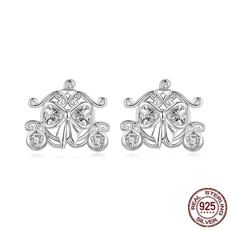 Pair of 925 silver retro pumpkin car stud earrings with romantic French design against a neutral background