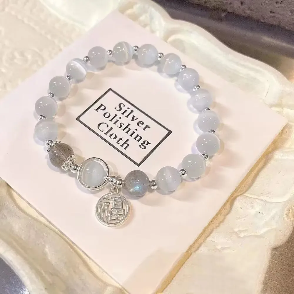 Glass butterfly bracelet for women with drop-shaped coloured glaze beads in grey moonlight colour option