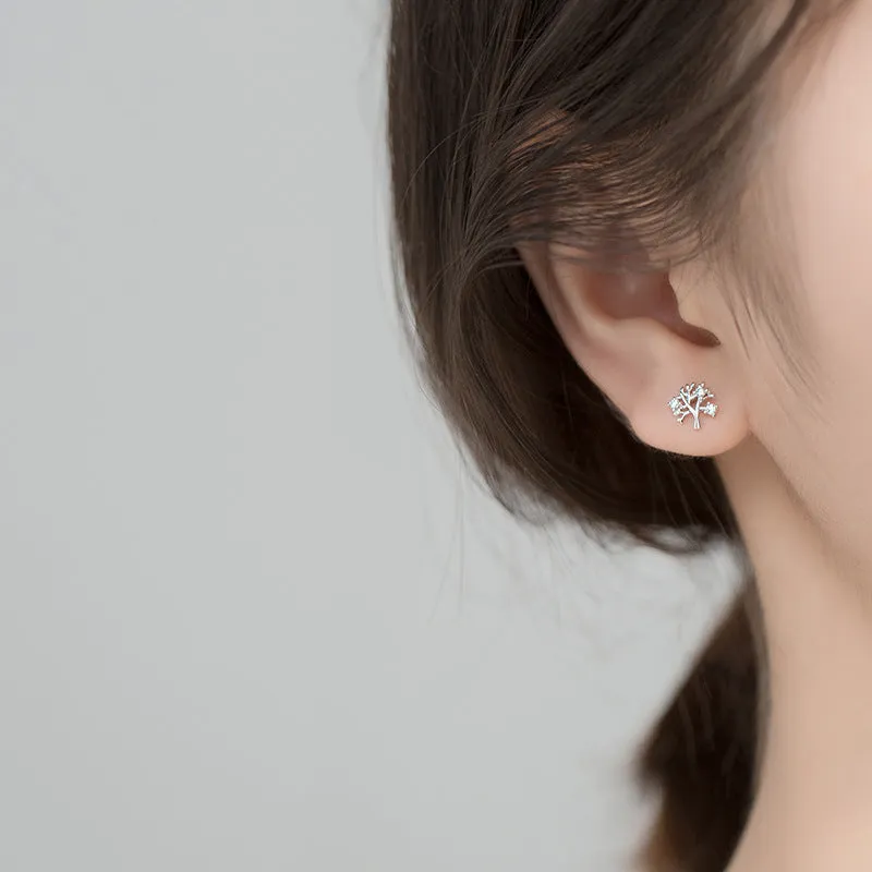 White gold coloured copper stud earrings with cute little tree design electroplated finish for women