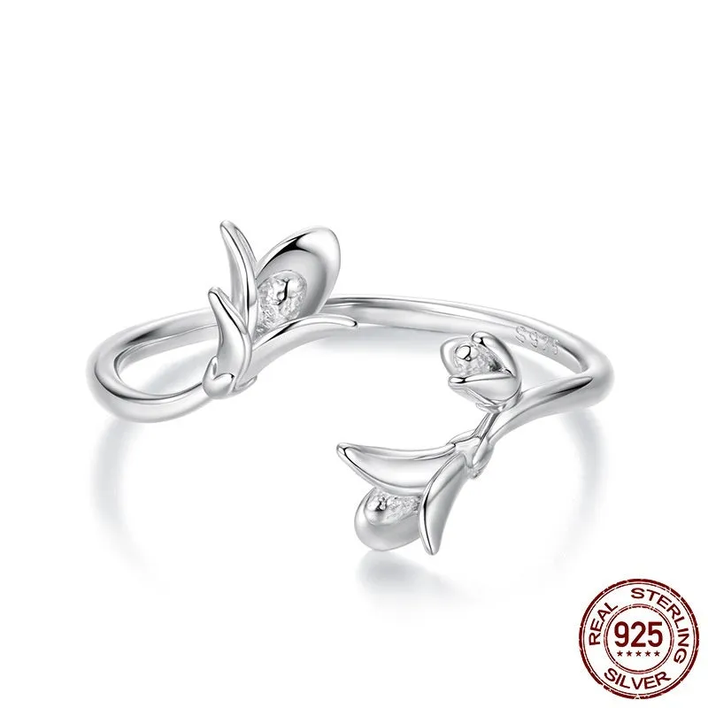 Women's S925 sterling silver lavender open ring with adjustable opening on a plain background