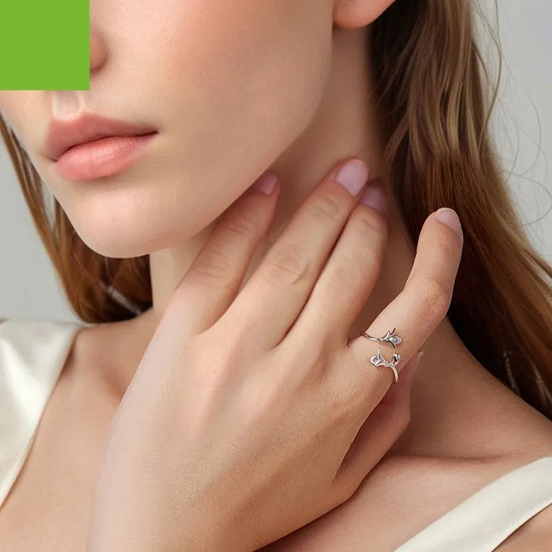 Women's S925 sterling silver lavender open ring with adjustable opening on a plain background