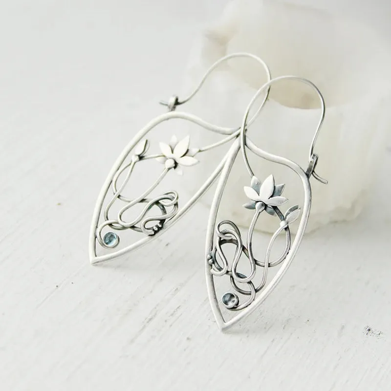 Silver lotus vine earrings with geometric retro design and round elements for women