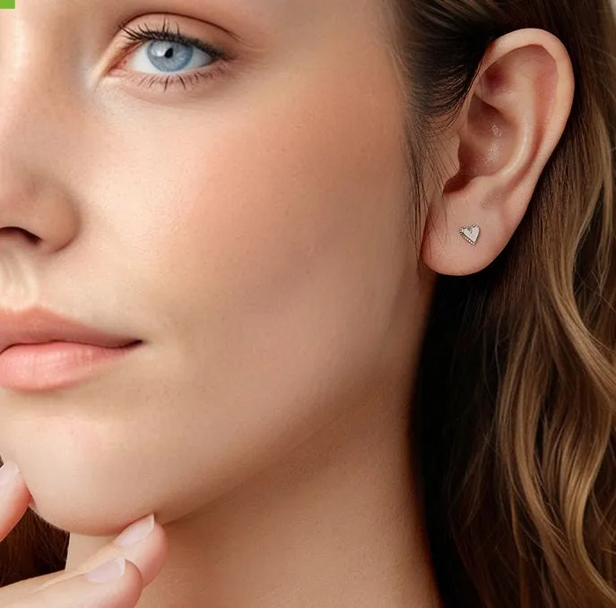 Simple S925 sterling silver heart-shaped ear studs with electroplated finish on a white background