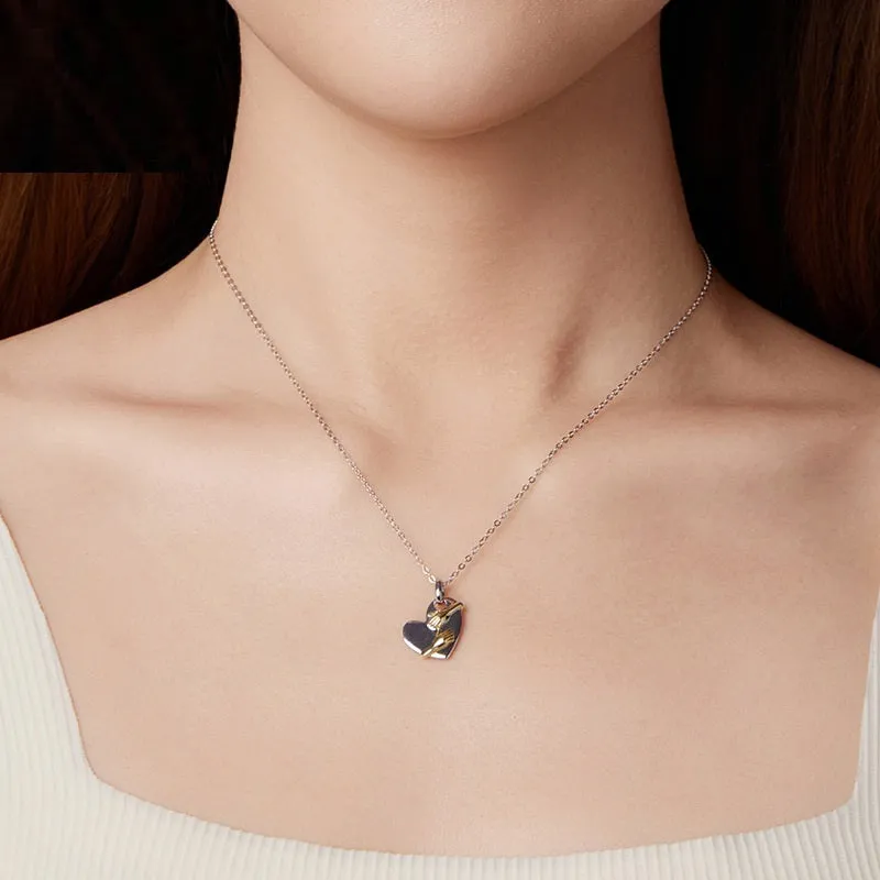 Original Hug Love 925 sterling silver heart necklace with adjustable O-ring chain on white background