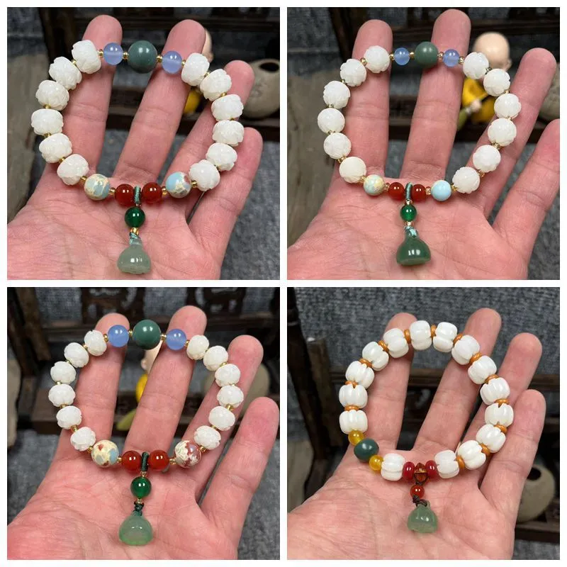 Carved bodhi root and white jade pumpkin lotus beads bracelet with cat's paw pendant.