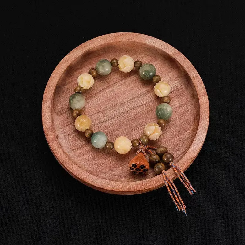 Carved bodhi root and white jade pumpkin lotus beads bracelet with cat's paw pendant.