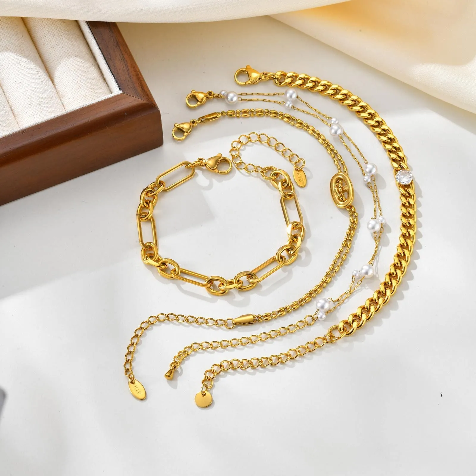 Women's titanium steel double-layer imitation pearl bracelet in geometric style with electroplated gold finish