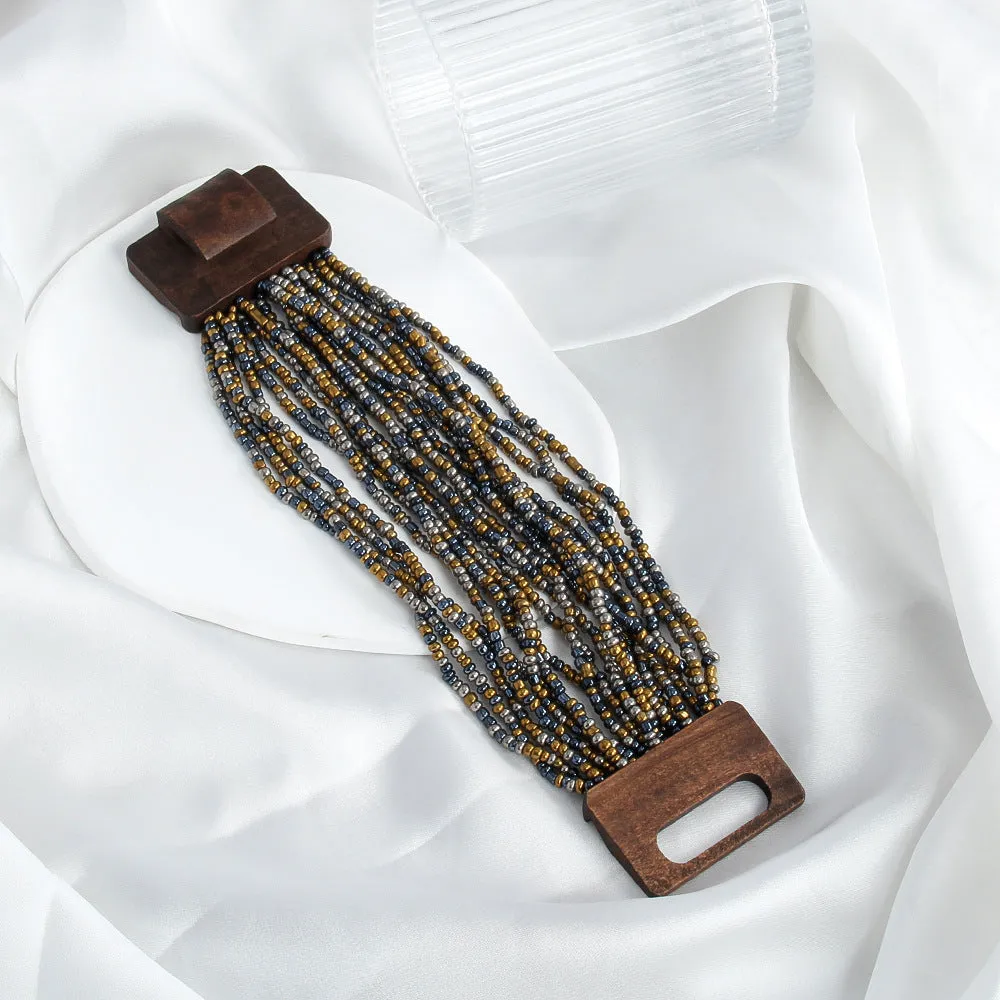 Handmade multi-layer elastic bracelet with rice-shaped glass and coloured glaze beads in geometric quadrilateral pattern, six colour options