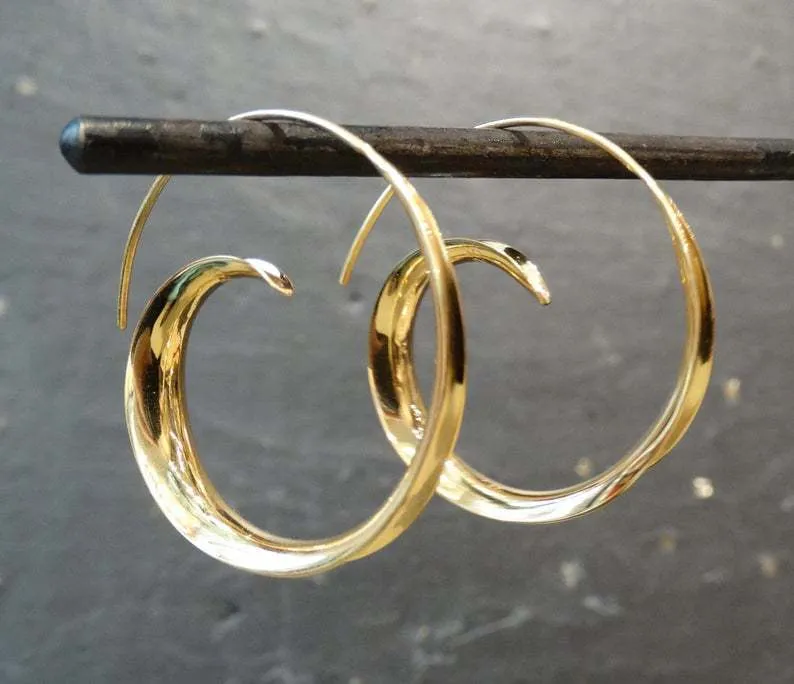 Round alloy ear studs with spiral leaf design in gold electroplated finish on white background