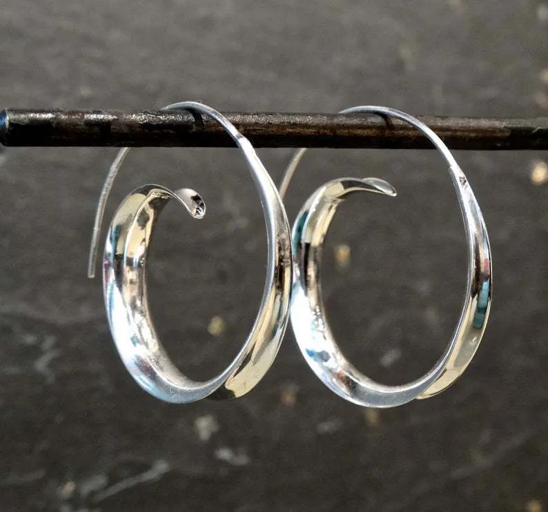 Round alloy ear studs with spiral leaf design in gold electroplated finish on white background