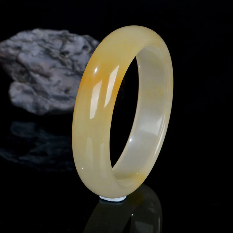Natural light jade bracelet in traditional Chinese style with polished surface