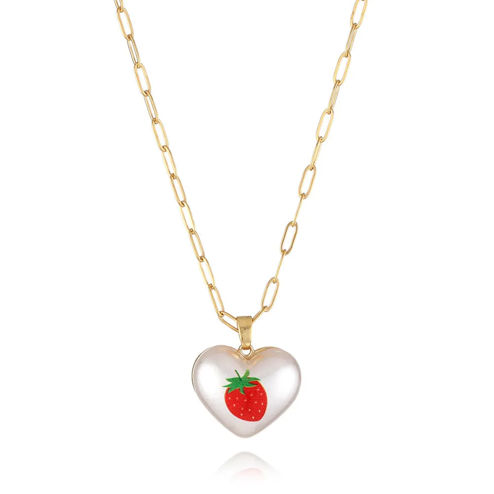 Heart-shaped necklace with geometric chain and a detailed fruit pendant charm, adjustable from 21cm to 50cm.