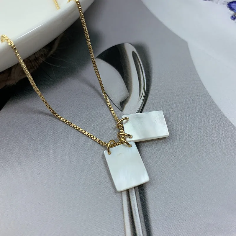 White mother pearl shellfish Jesus Virgin Mary pendant on a 45cm alloy box chain with electroplated white finish