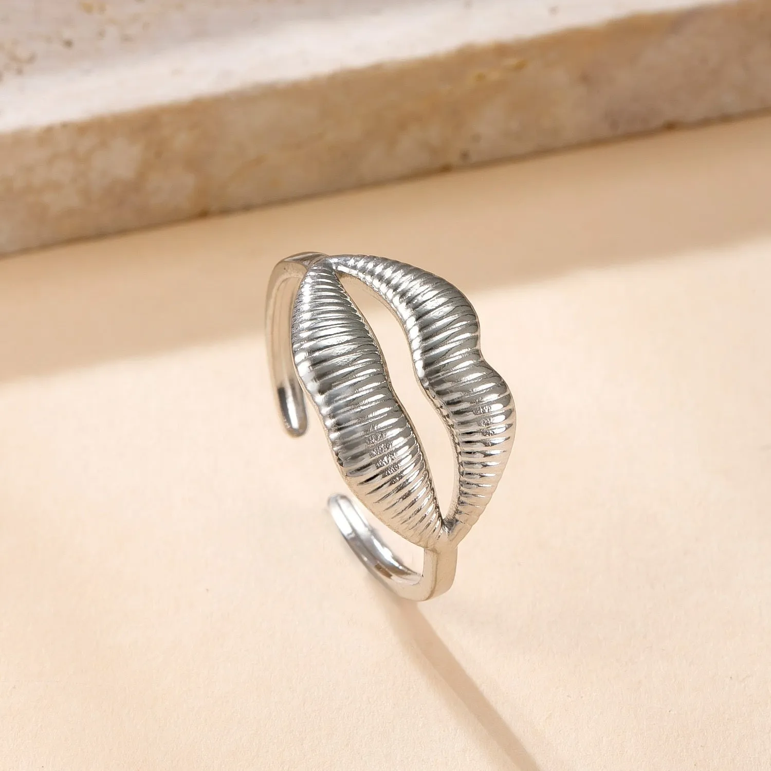 Stainless steel open ring with hollow star and moon design, electroplating finish, unisex average size.