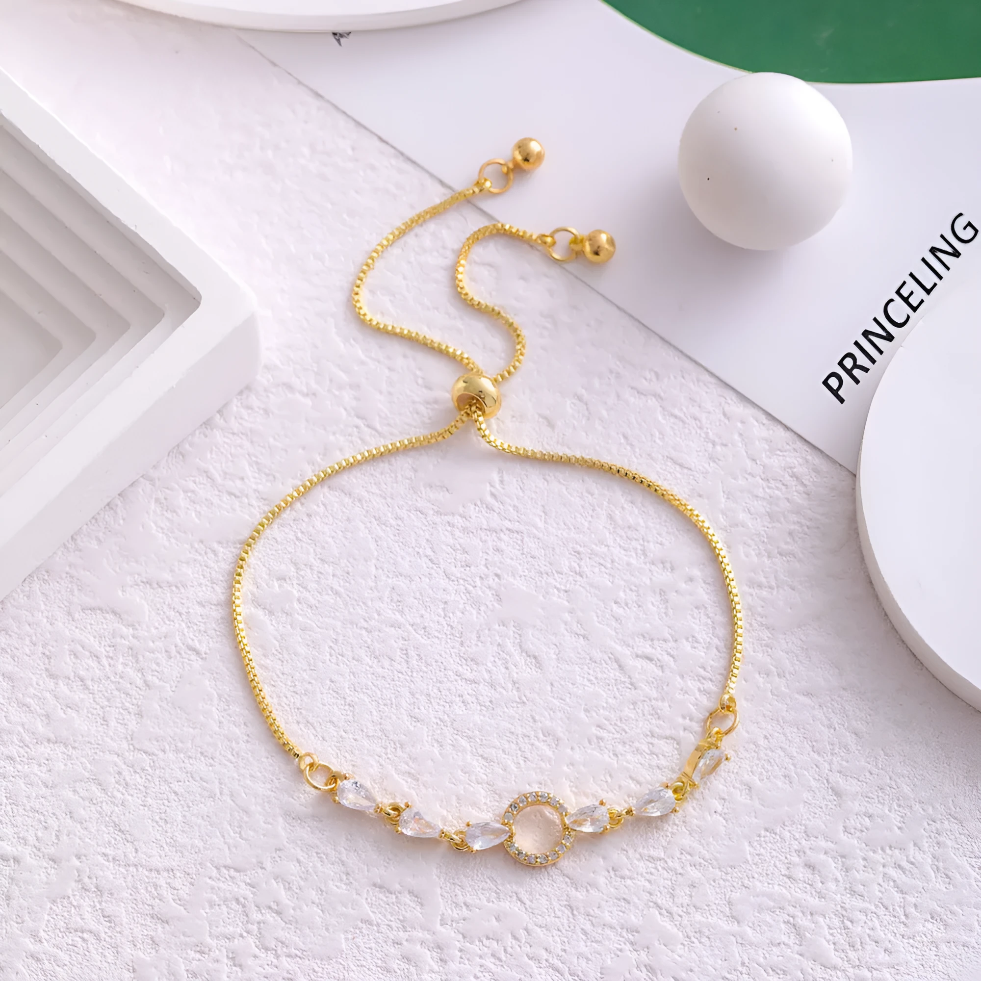 Copper micro inlaid zircon simple circle bracelet YS047 gold on white background