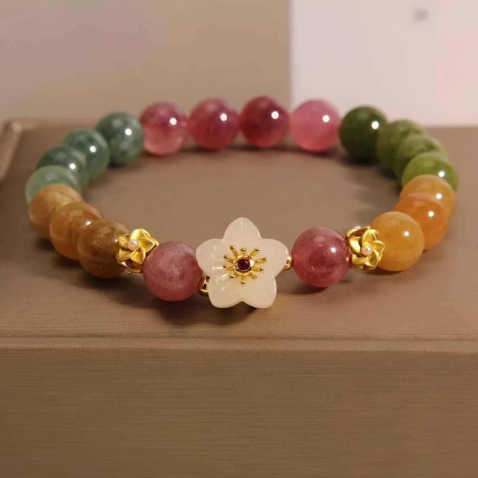 Natural tourmaline flower bracelet with geometric shapes and electroplated metal components