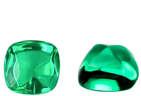 Cultivated emerald green treasure shaped colored gemstone round cut polished loose stone on white background