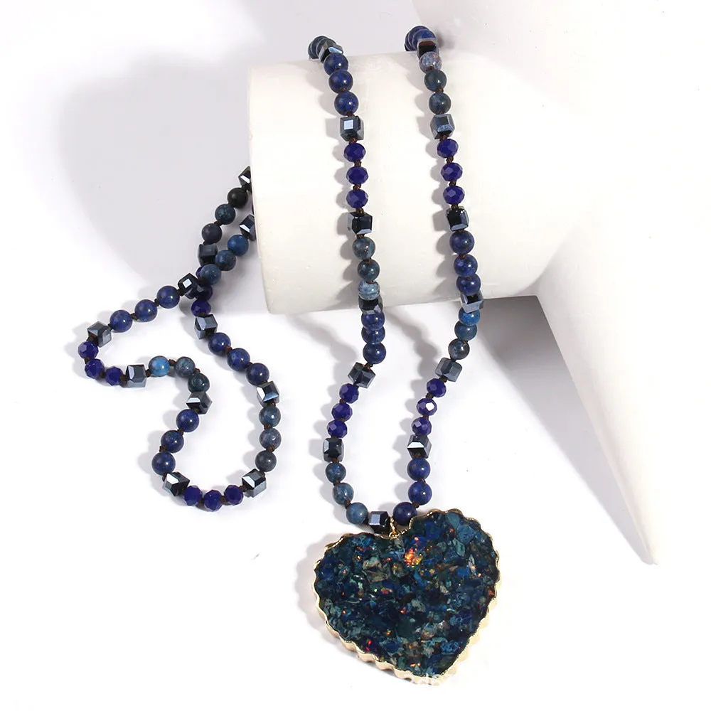 Bohemian style long chain heart pendant necklace in stone and glass with electroplated finish, available in multiple colours.