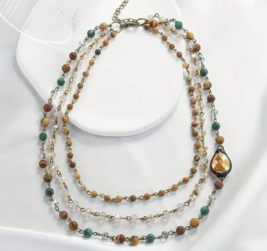 Handmade bohemian multi-layer necklace with natural stone and glass drop-shaped beads in blue-green colour
