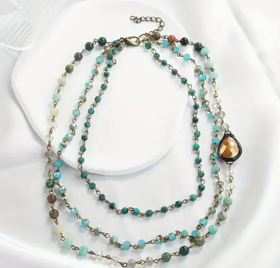 Handmade bohemian multi-layer necklace with natural stone and glass drop-shaped beads in blue-green colour