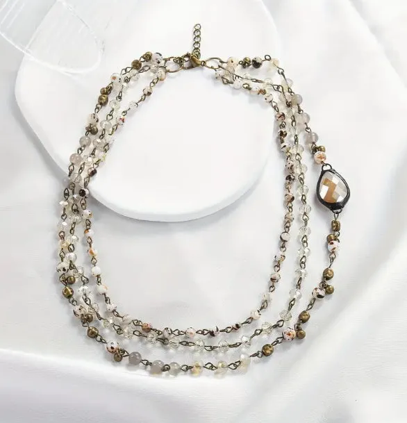 Handmade bohemian multi-layer necklace with natural stone and glass drop-shaped beads in blue-green colour