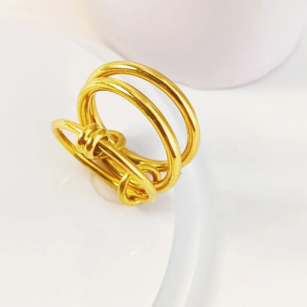 Sanhuan titanium steel ring geometric line design Trinity gold B398 on finger unisex size no 7