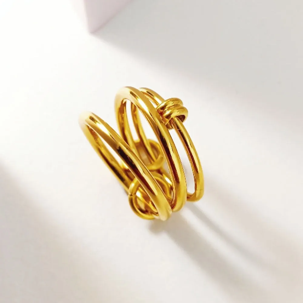 Sanhuan titanium steel ring geometric line design Trinity gold B398 on finger unisex size no 7