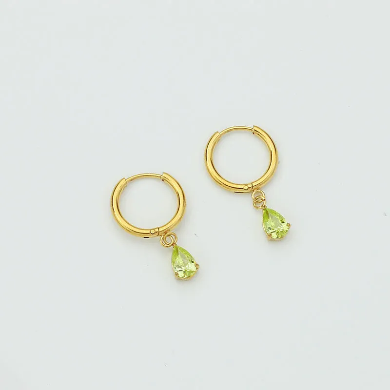 Drop-shaped zircon earrings in seven colours on a woman's earlobe titanium steel geometric design