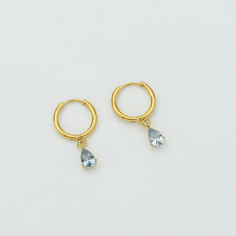 Drop-shaped zircon earrings in seven colours on a woman's earlobe titanium steel geometric design